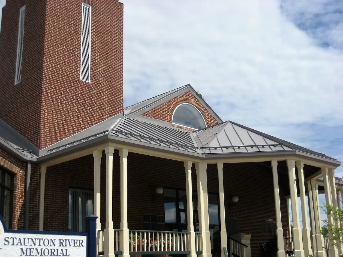 Skilled roofing craftsmen working on a residential roof in Carefree Fore